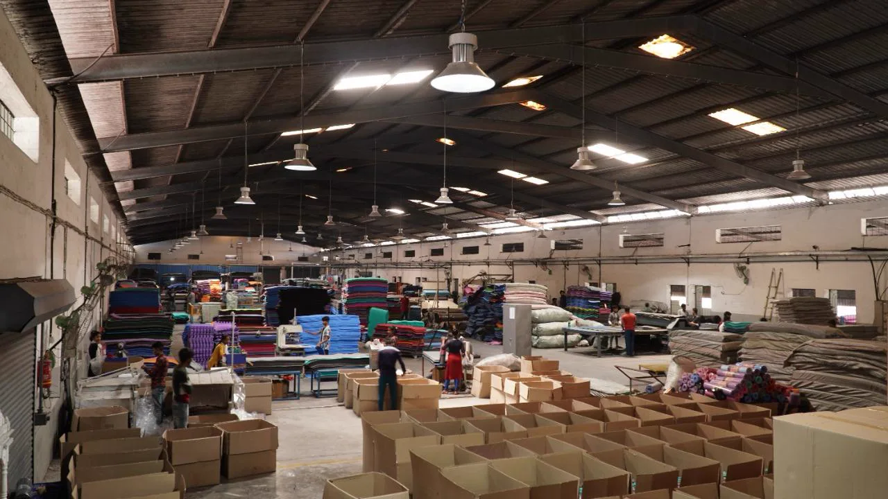 The packing hall at the Arcturus plant, with rows of cartons