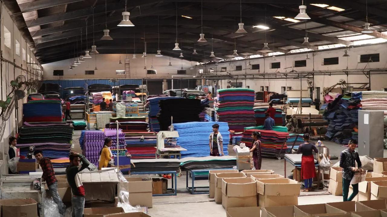 Cutting and finishing tables among stacks of foam